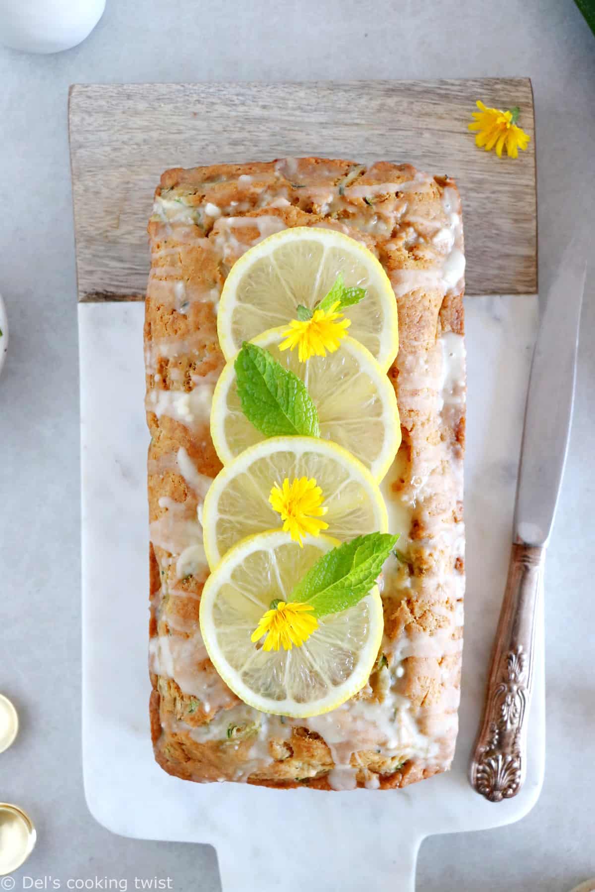 This healthy vegan lemon zucchini bread is light, fluffy and perfectly tender, with a subtle lemon glaze.