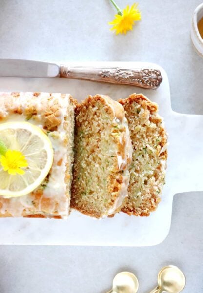 This healthy vegan lemon zucchini bread is light, fluffy and perfectly tender, with a subtle lemon glaze.