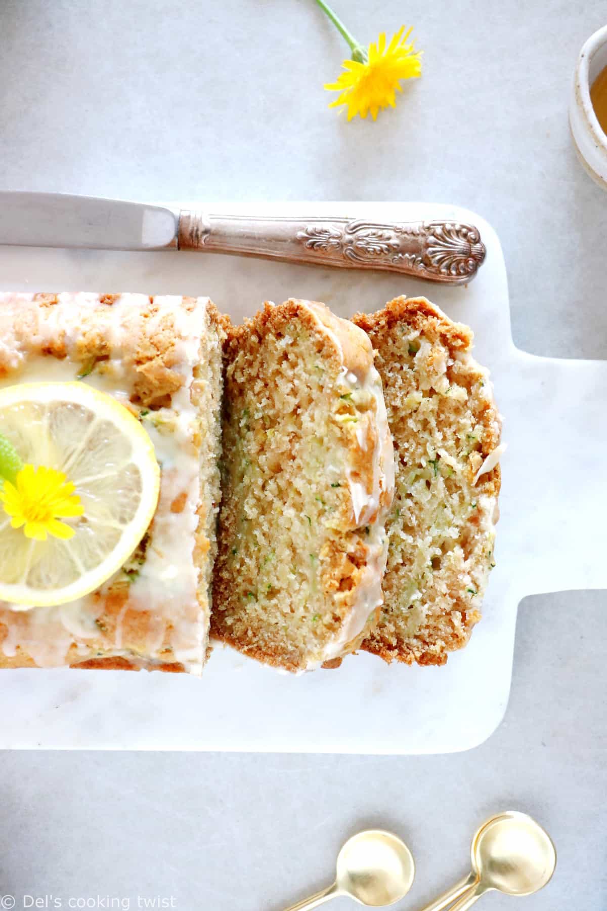 This healthy vegan lemon zucchini bread is light, fluffy and perfectly tender, with a subtle lemon glaze.