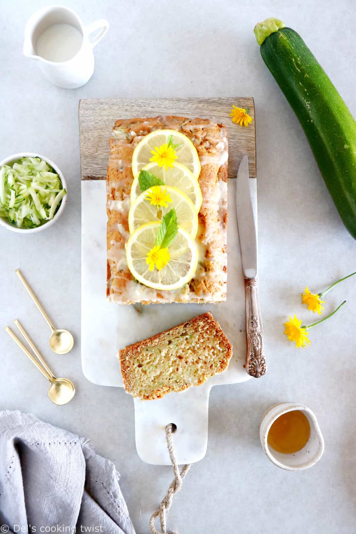 This healthy vegan lemon zucchini bread is light, fluffy and perfectly tender, with a subtle lemon glaze.