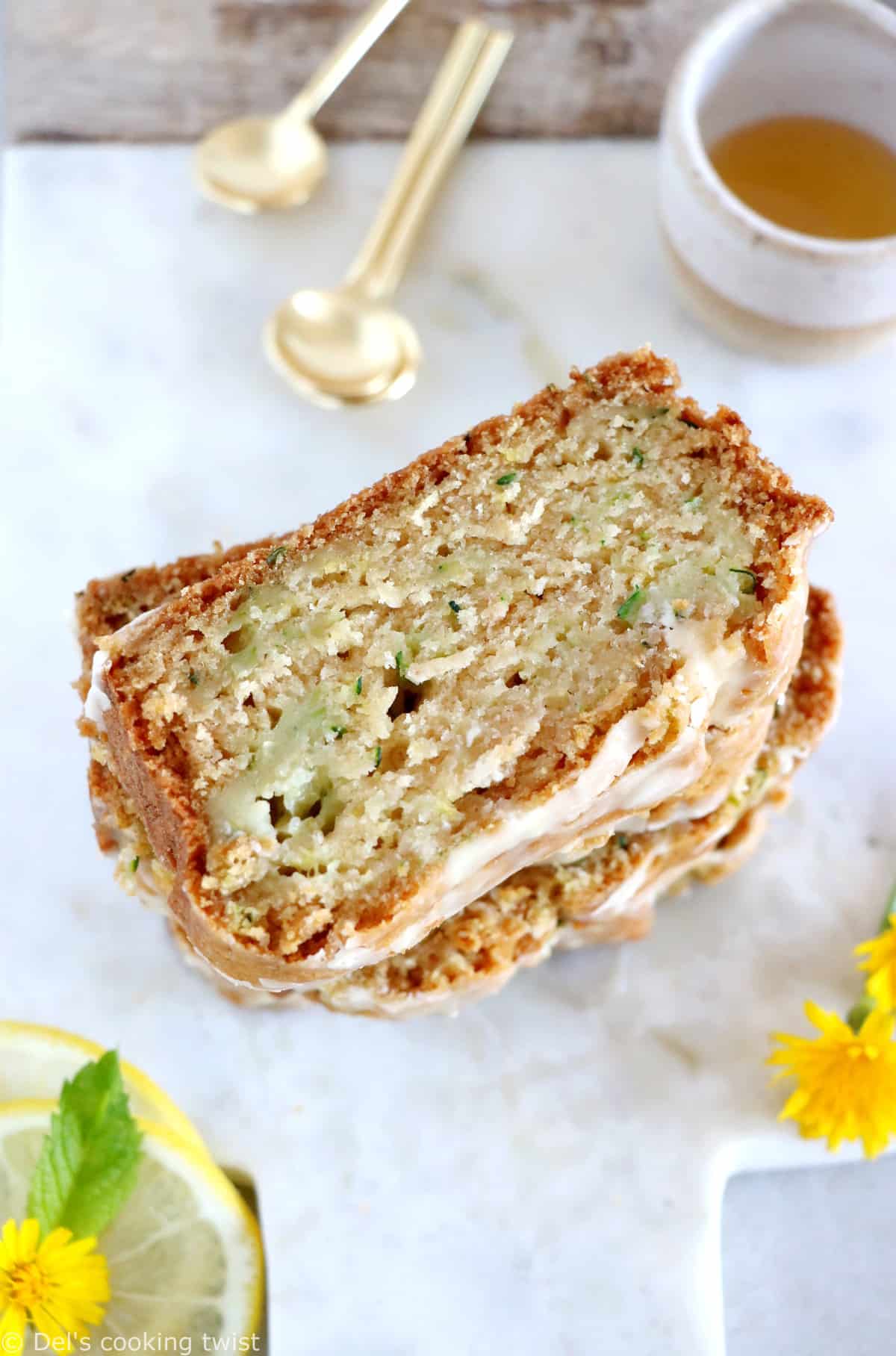 This healthy vegan lemon zucchini bread is light, fluffy and perfectly tender, with a subtle lemon glaze.