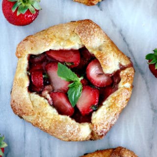 These mini balsamic strawberry galettes are packed with juicy, sweet and sour flavors, all wrapped up in a flaky buttery crust.