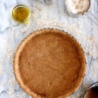 This Olive Oil Whole Wheat Pie Crust is a 100% vegan pie crust and a perfect alternative to a classic butter pie crust.