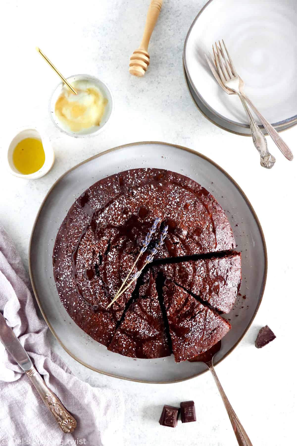 You'll love this Easy Chocolate Olive Oil Yogurt Cake. Directly inspired from the classic French Yogurt Cake, this no-fail recipe is moist, tender, and deliciously chocolaty.