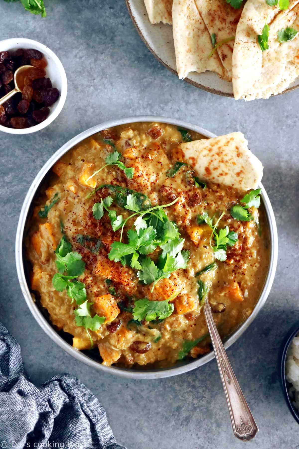 This Vegan Indian Mango Butternut Squash Curry features a creamy mango curry sauce, diced butternut squash, all wrapped in some delicious warm spices.