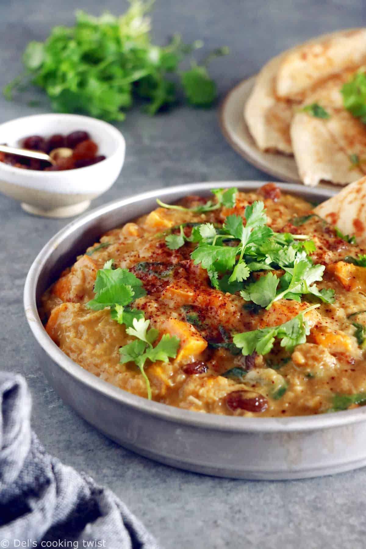 This Vegan Indian Mango Butternut Squash Curry features a creamy mango curry sauce, diced butternut squash, all wrapped in some delicious warm spices.