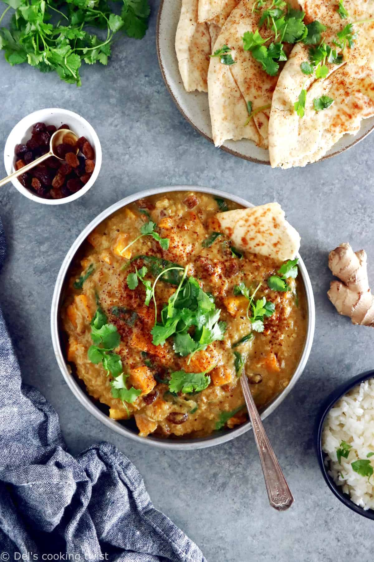 This Vegan Indian Mango Butternut Squash Curry features a creamy mango curry sauce, diced butternut squash, all wrapped in some delicious warm spices.