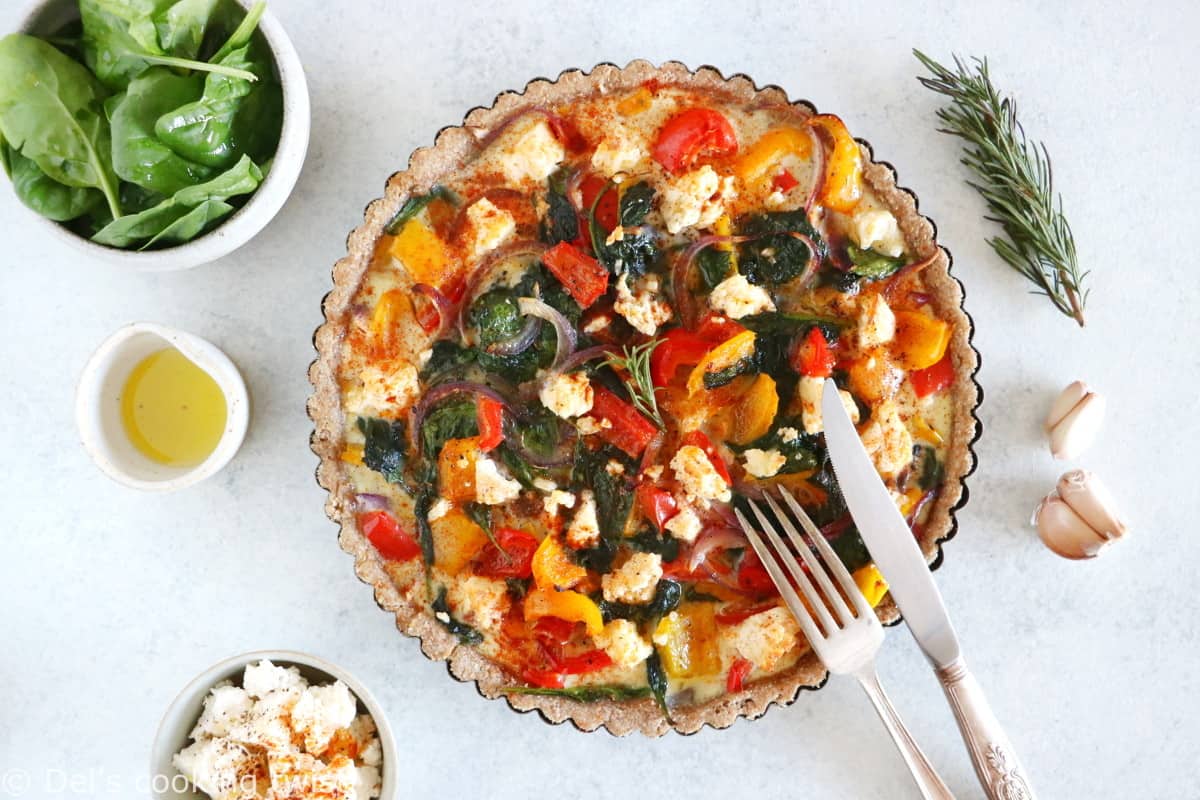 Mediterranean Vegetable Quiche is packed with sun-drenched summer vegetables, feta cheese, and my favorite olive oil whole wheat pie crust.