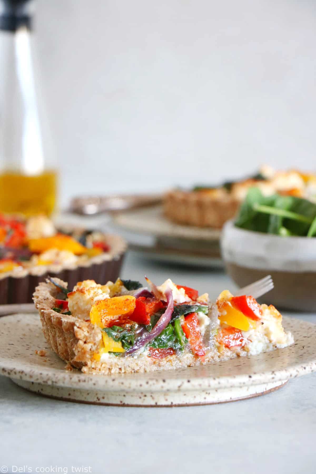 Mediterranean Vegetable Quiche is packed with sun-drenched summer vegetables, feta cheese, and my favorite olive oil whole wheat pie crust.