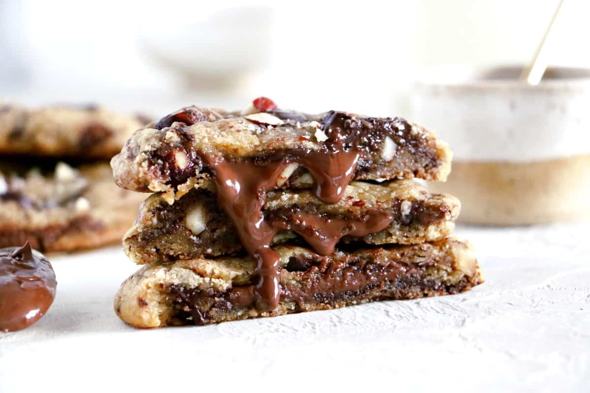 These hazelnut chocolate lava cookies are thick and soft in texture, and bursting with a molten core of chocolate.