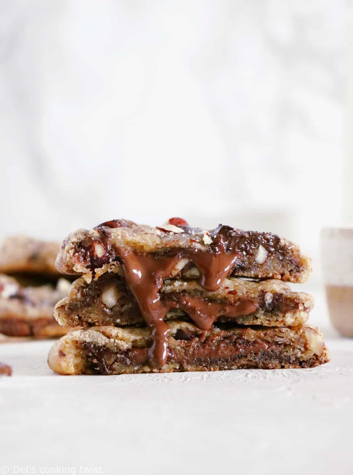 These hazelnut chocolate lava cookies are thick and soft in texture, and bursting with a molten core of chocolate.