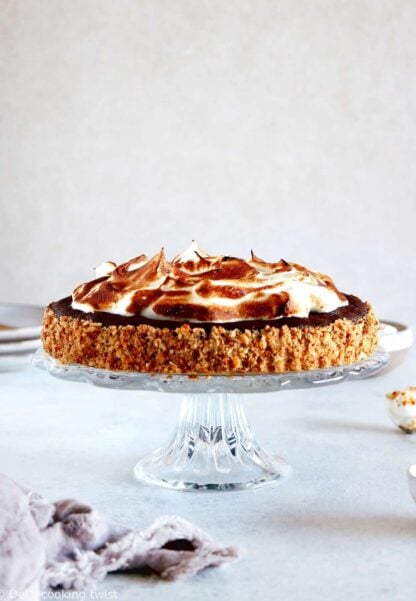 This Chocolate Brownie Meringue Pie with Pretzel Crust sits in a crunchy salty bottom crust, a rich and fudgy chocolate brownie layer and a homemade Italian meringue on top.