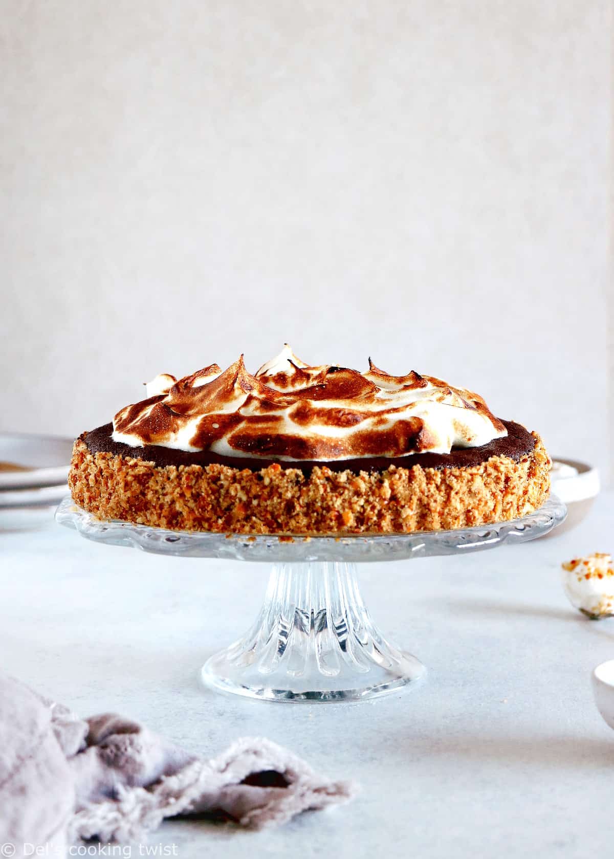 This Chocolate Brownie Meringue Pie with Pretzel Crust sits in a crunchy salty bottom crust, a rich and fudgy chocolate brownie layer and a homemade Italian meringue on top.