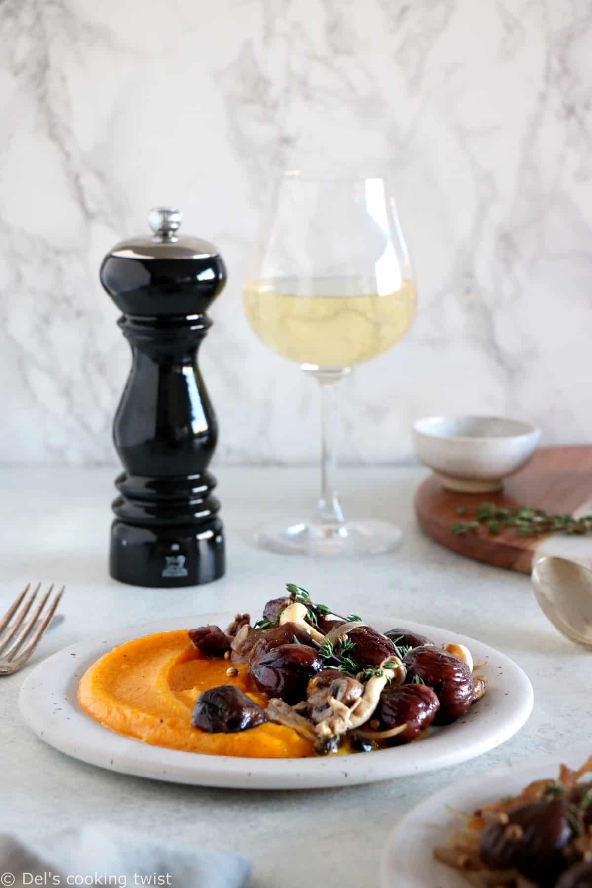 Both festive and hearty, this chestnut and mushroom casserole with allspice butternut squash puree will make an elegant centerpiece on your holiday table.