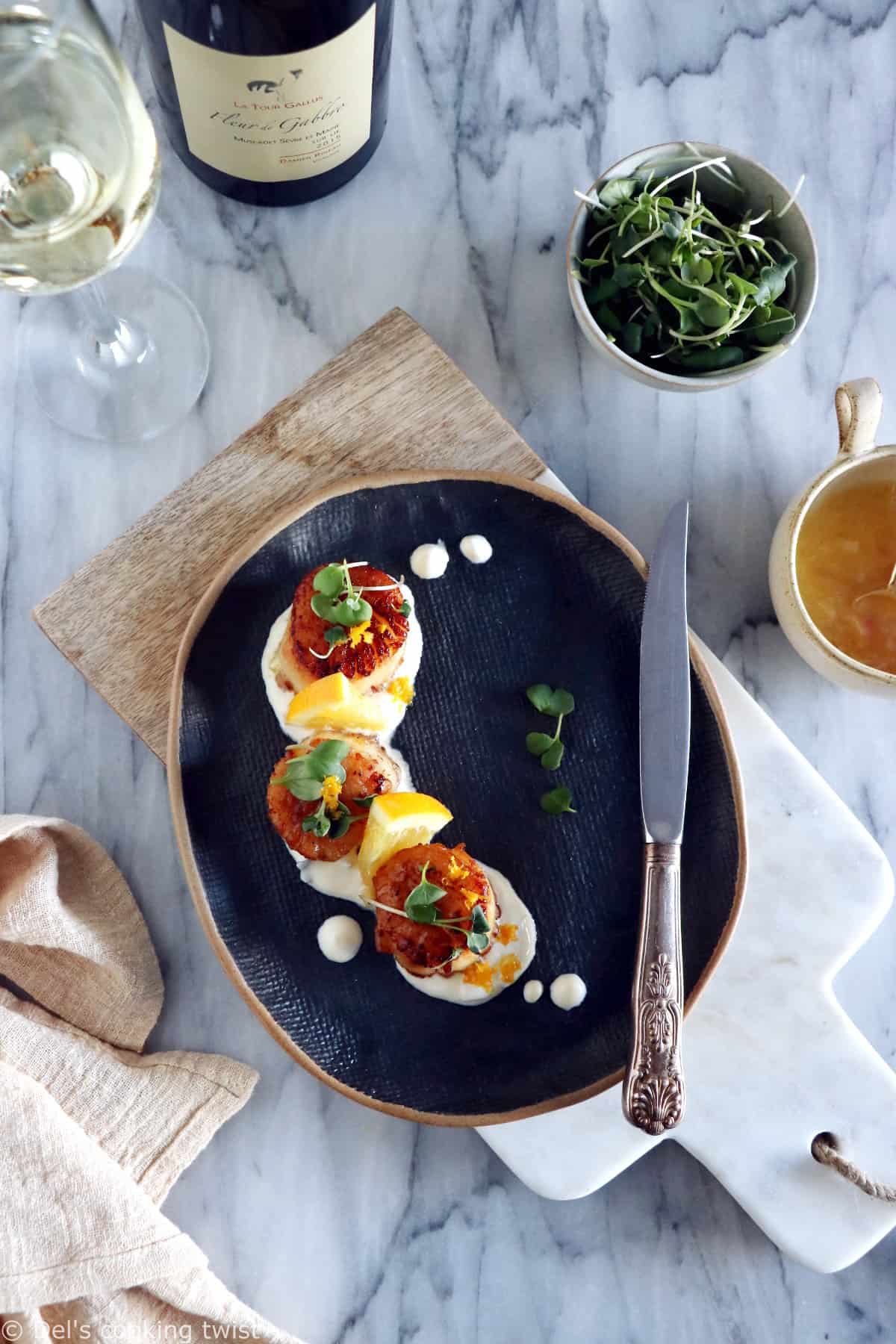 Pan-seared scallops with an orange ginger sauce is a light, elegant dish, enhanced with citrus flavors. Ready under 20 minutes, it's a lovely starter to a 3-course dinner.