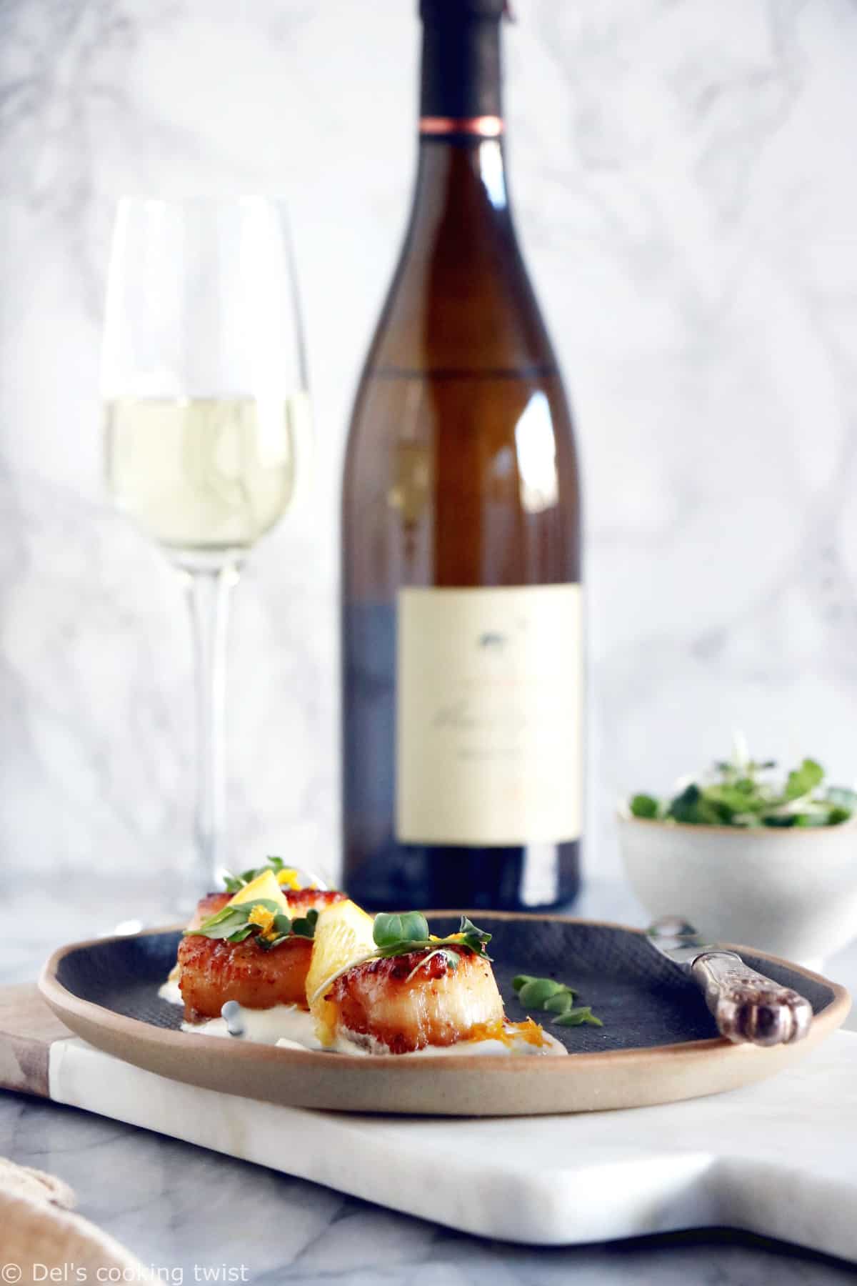 Pan-seared scallops with an orange ginger sauce is a light, elegant dish, enhanced with citrus flavors. Ready under 20 minutes, it's a lovely starter to a 3-course dinner.