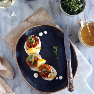 Pan-seared scallops with an orange ginger sauce is a light, elegant dish, enhanced with citrus flavors. Ready under 20 minutes, it's a lovely starter to a 3-course dinner.