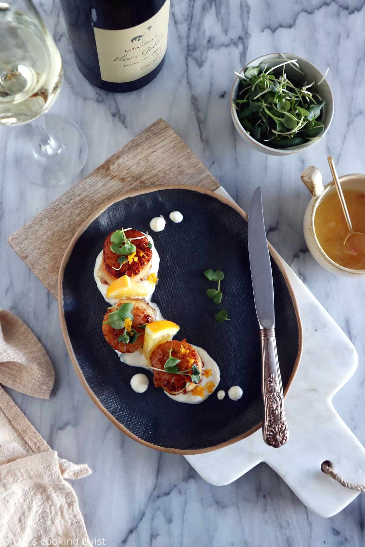 Pan-seared scallops with an orange ginger sauce is a light, elegant dish, enhanced with citrus flavors. Ready under 20 minutes, it's a lovely starter to a 3-course dinner.