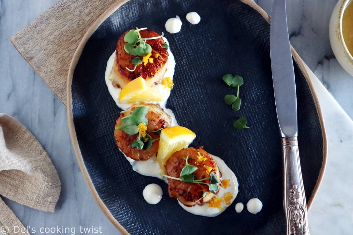 Pan-seared scallops with an orange ginger sauce is a light, elegant dish, enhanced with citrus flavors. Ready under 20 minutes, it's a lovely starter to a 3-course dinner.