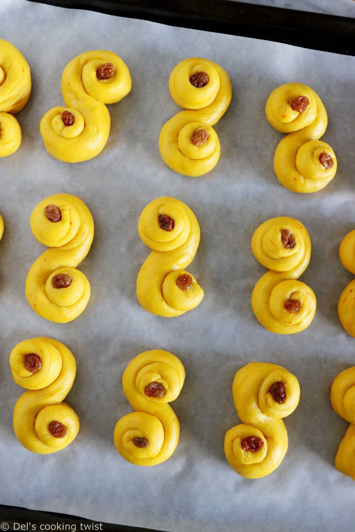 Swedish Saffron Buns "Lussekatter" (or St Lucia Buns) are an S-shape sweet bun flavored with saffron.