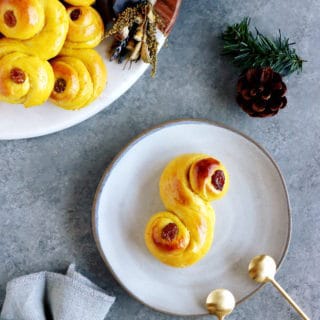 Swedish Saffron Buns "Lussekatter" (or St Lucia Buns) are an S-shape sweet bun flavored with saffron.