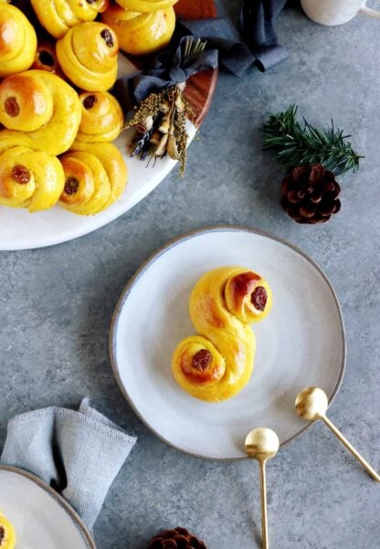 Swedish Saffron Buns "Lussekatter" (or St Lucia Buns) are an S-shape sweet bun flavored with saffron.