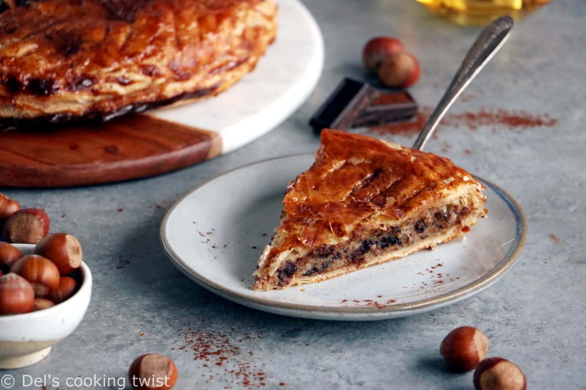 This Hazelnut Chocolate Galette des Rois features a hazelnut frangipane (instead of almond) and some grated dark chocolate, wrapped in between 2 sheets of puff pastry.