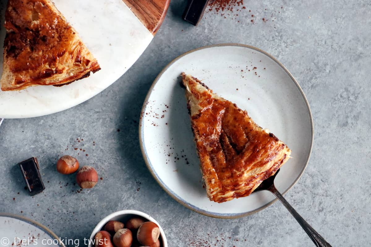 This Hazelnut Chocolate Galette des Rois features a hazelnut frangipane (instead of almond) and some grated dark chocolate, wrapped in between 2 sheets of puff pastry.