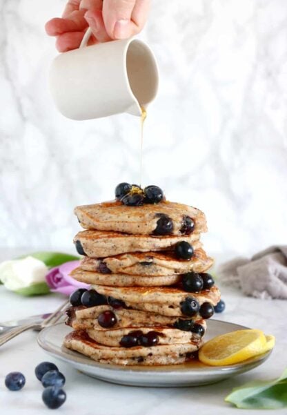 These lemon poppy seed blueberry pancakes are sugar-free, packed with fruits and prepared with whole-wheat flour.