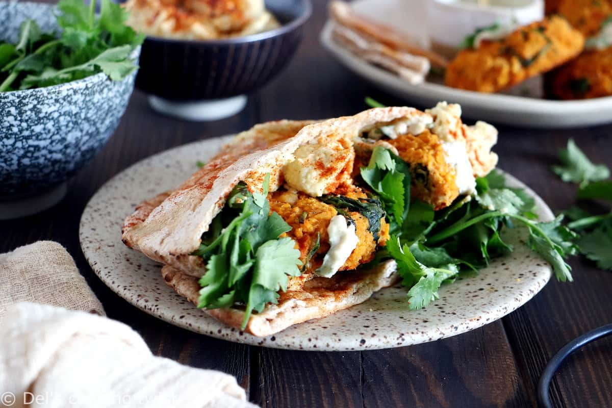 Easy and delicious red lentil patties served with a garlic-herb tahini sauce. Both vegan and gluten-free, these veggie patties are bursting with savory flavors, hearty texture, and oodles of plant-based protein.