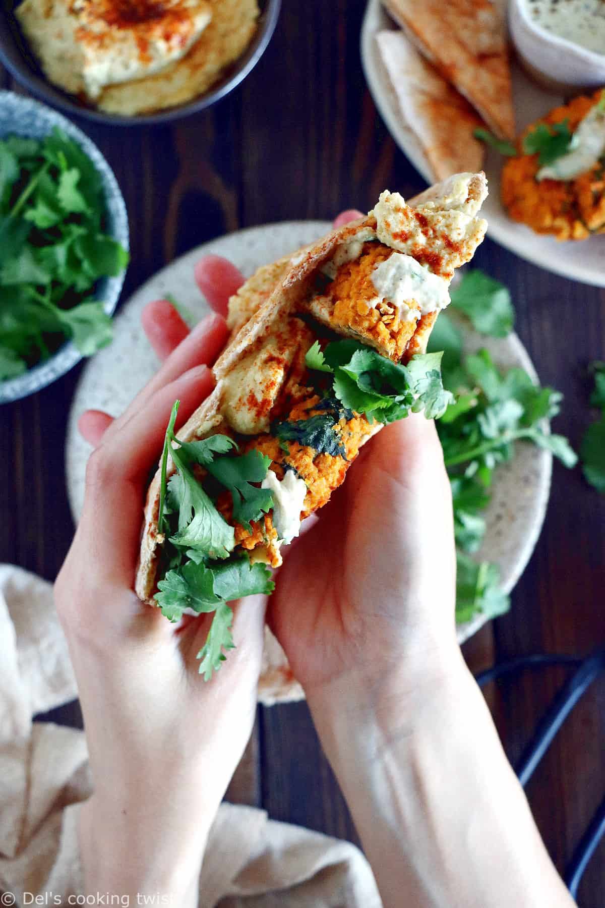 Easy and delicious red lentil patties served with a garlic-herb tahini sauce. Both vegan and gluten-free, these veggie patties are bursting with savory flavors, hearty texture, and oodles of plant-based protein.