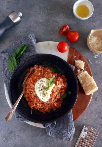 This spicy tomato risotto with burrata cheese is not your regular risotto. Subtly spiced up with harissa, it is packed with juicy and garlicky flavors with a little spicy kick.