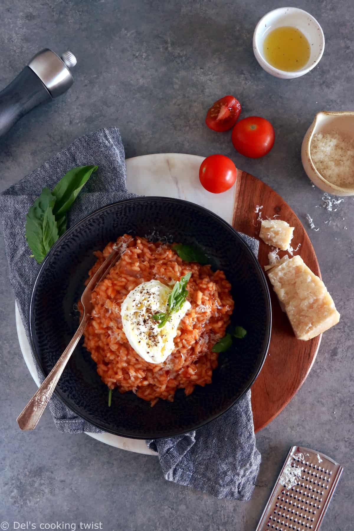 This spicy tomato risotto with burrata cheese is not your regular risotto. Subtly spiced up with harissa, it is packed with juicy and garlicky flavors with a little spicy kick.