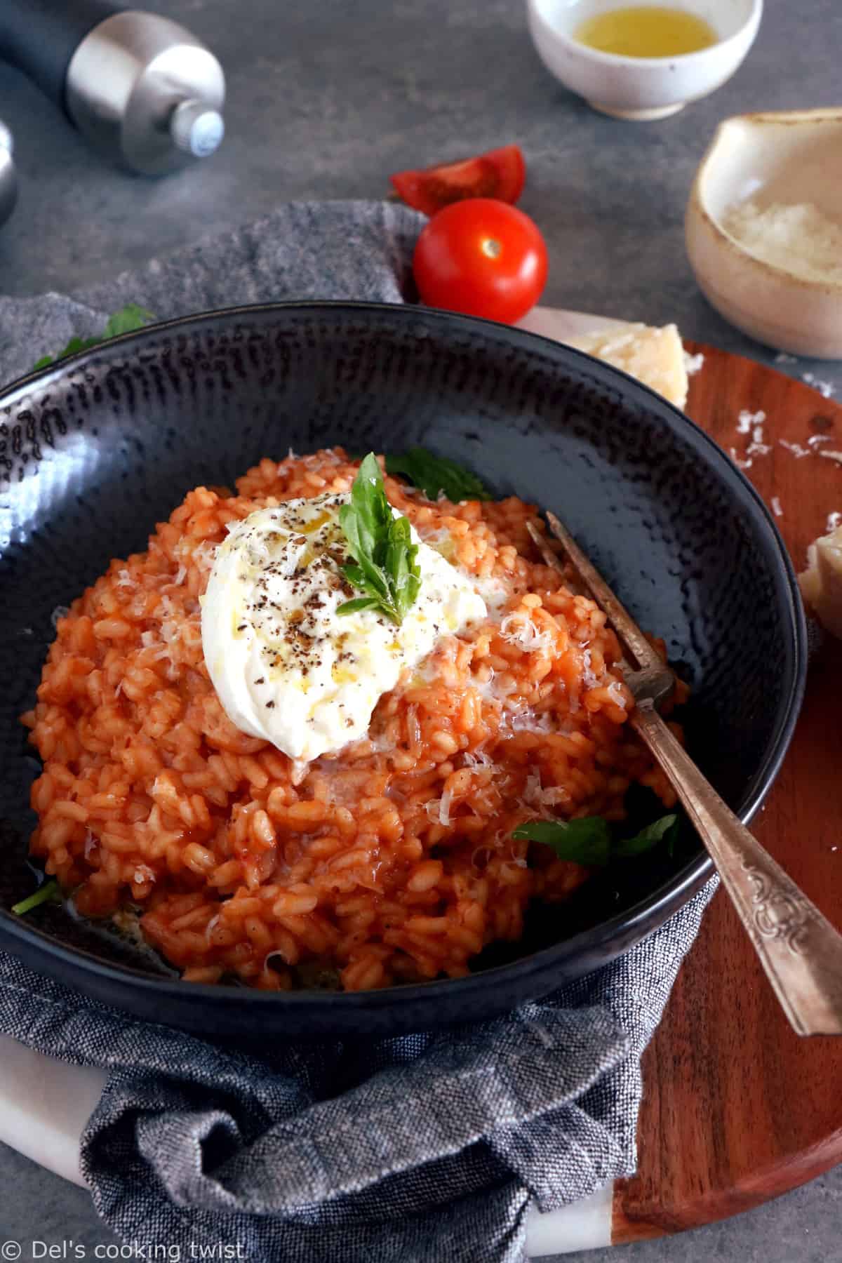 This spicy tomato risotto with burrata cheese is not your regular risotto. Subtly spiced up with harissa, it is packed with juicy and garlicky flavors with a little spicy kick.