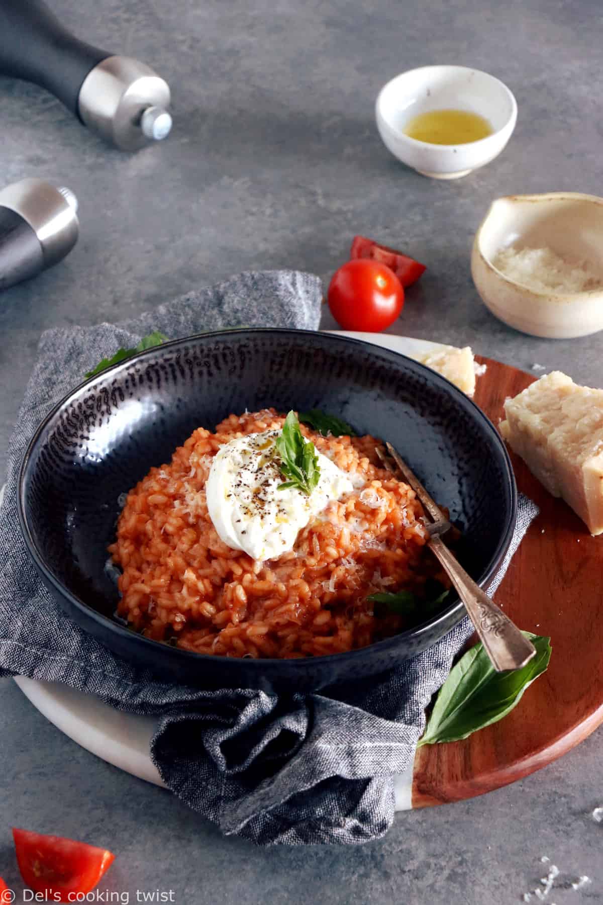 This spicy tomato risotto with burrata cheese is not your regular risotto. Subtly spiced up with harissa, it is packed with juicy and garlicky flavors with a little spicy kick.