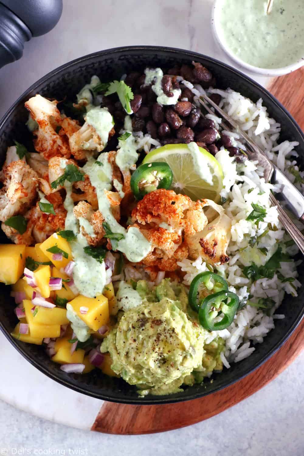 Healthy, colorful, and satisfying, this vegetarian cauliflower burrito bowl will brighten up your lunch game.