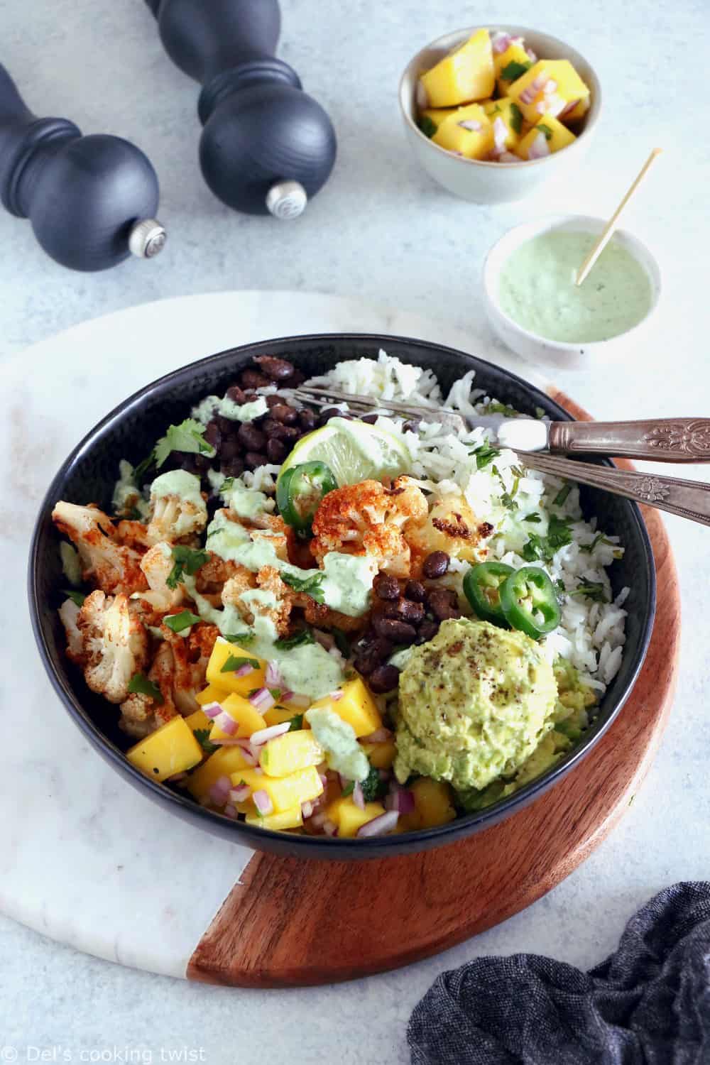 Healthy, colorful, and satisfying, this vegetarian cauliflower burrito bowl will brighten up your lunch game.