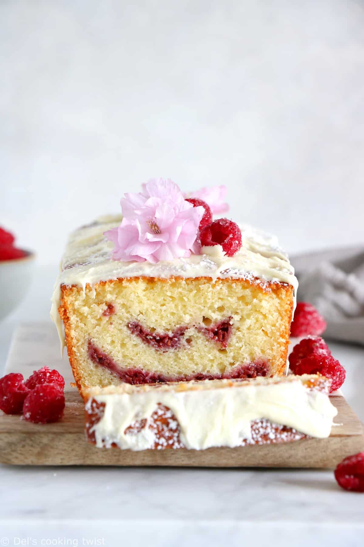 Delicious and easy to make, this white chocolate raspberry marble cake is filled with jammy raspberry swirls and topped with a generous and sweet layer of white chocolate.