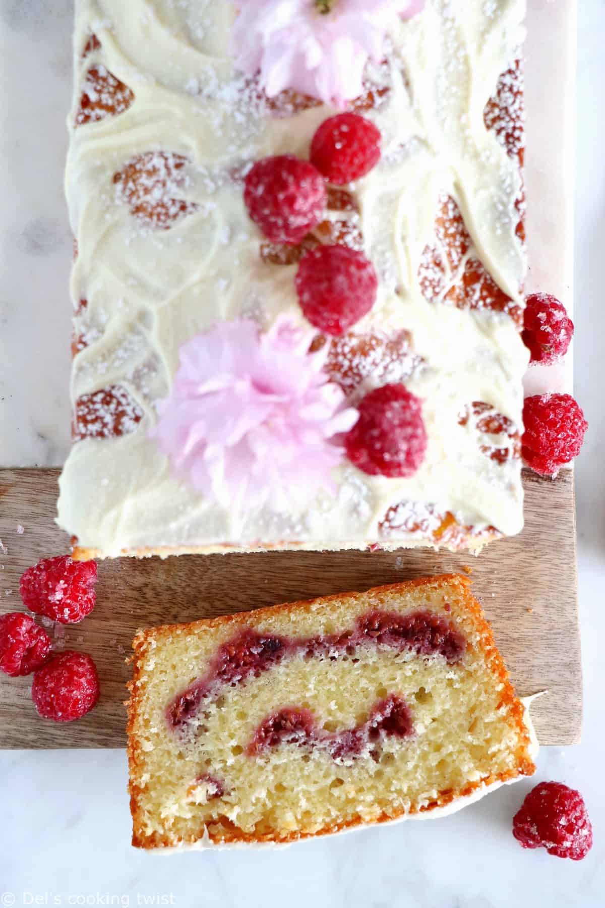 Delicious and easy to make, this white chocolate raspberry marble cake is filled with jammy raspberry swirls and topped with a generous and sweet layer of white chocolate.
