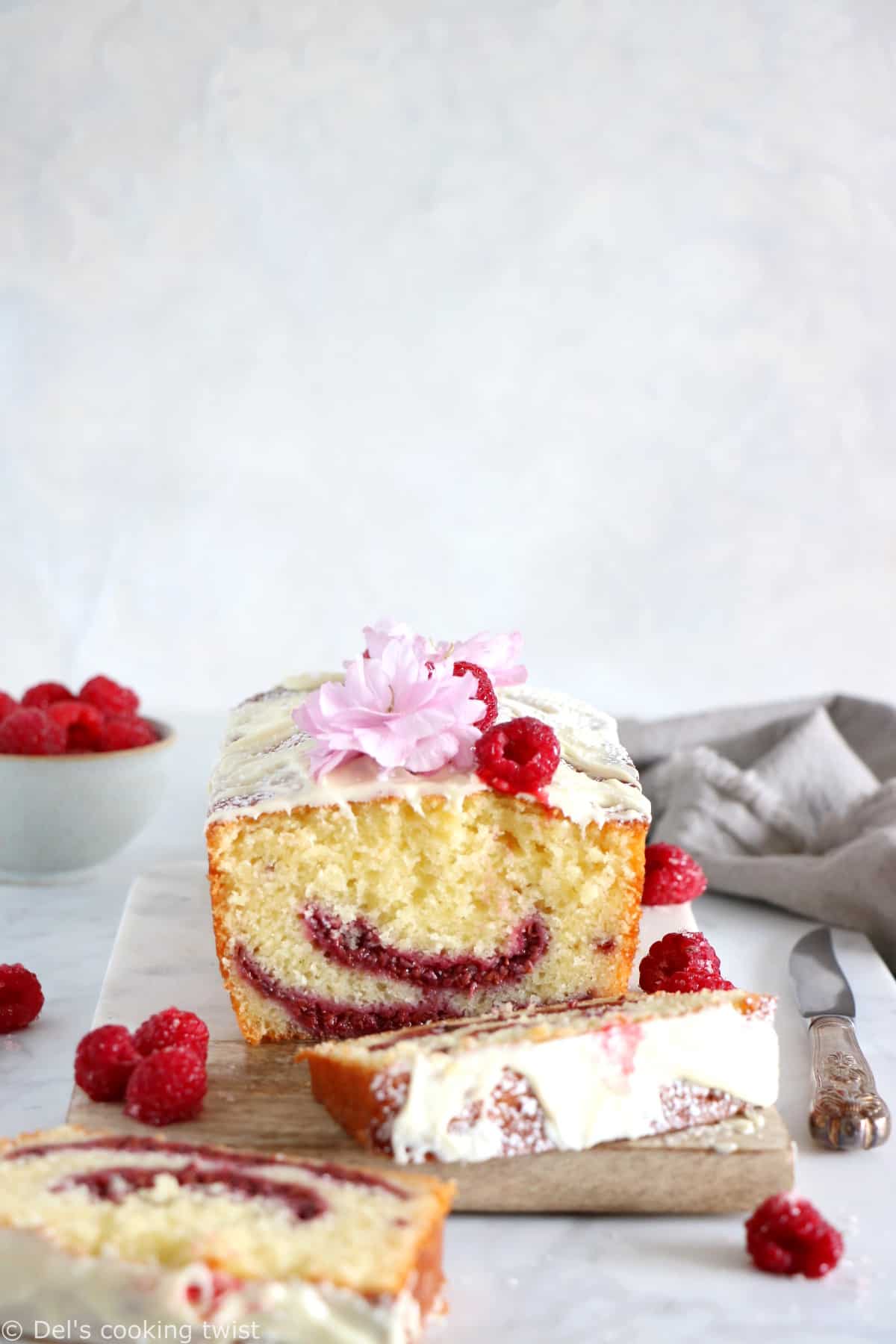 Delicious and easy to make, this white chocolate raspberry marble cake is filled with jammy raspberry swirls and topped with a generous and sweet layer of white chocolate.