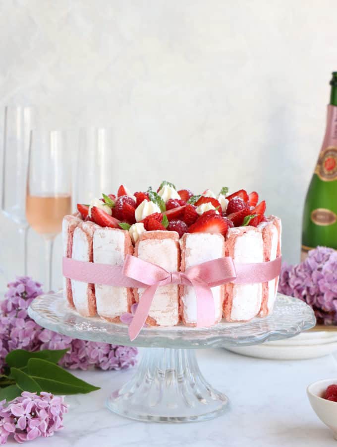 Fancy, elegant and stunningly beautiful, the French strawberry charlotte cake ("Charlotte aux Fraises") with white chocolate makes a delicious celebration cake.
