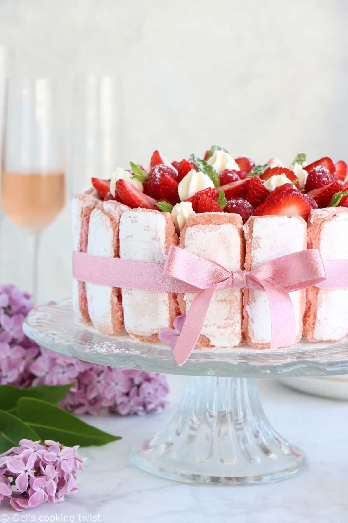 Fancy, elegant and stunningly beautiful, the French strawberry charlotte cake ("Charlotte aux Fraises") with white chocolate makes a delicious celebration cake.