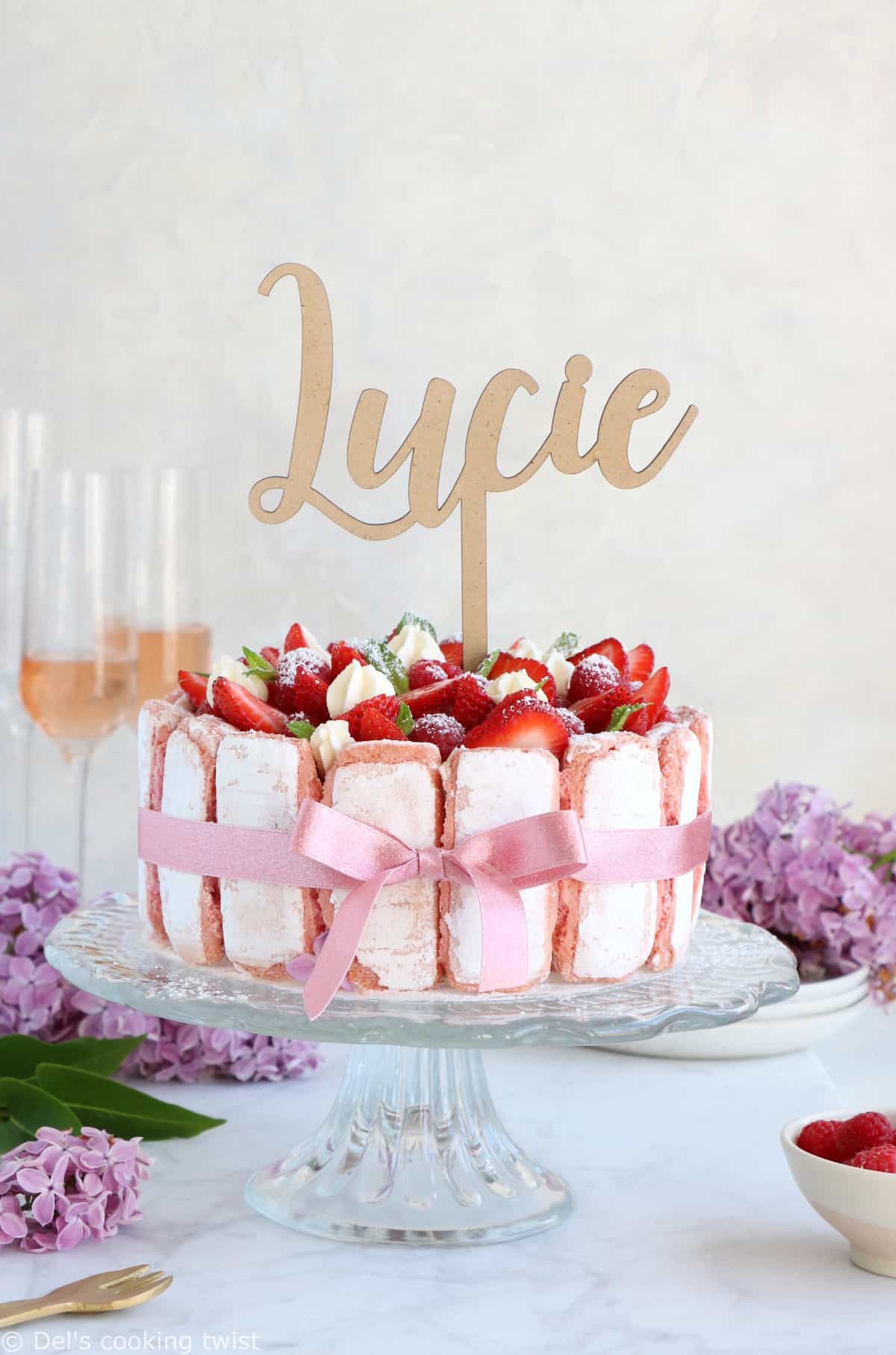 Fancy, elegant and stunningly beautiful, the French strawberry charlotte cake ("Charlotte aux Fraises") with white chocolate makes a delicious celebration cake.