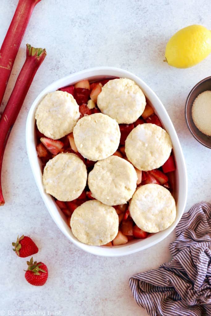 This rhubarb, strawberry, apple cobbler features a sweet and tangy fruity filling topped with some flaky dropped biscuits.