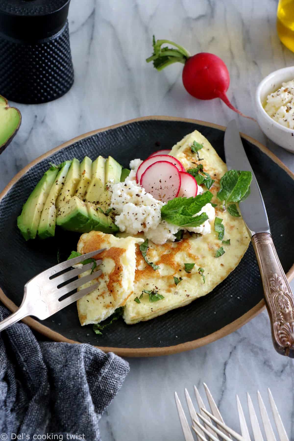 This simple mint ricotta omelet is light, fluffy, and subtly flavored with fresh mint leaves. It doesn't get any more complicated than that.