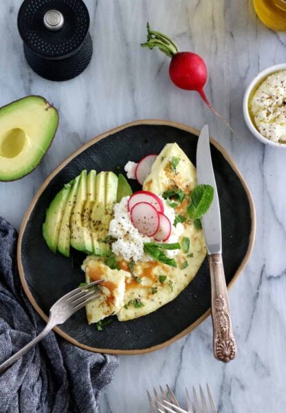 This simple mint ricotta omelet is light, fluffy, and subtly flavored with fresh mint leaves. It doesn't get any more complicated than that.