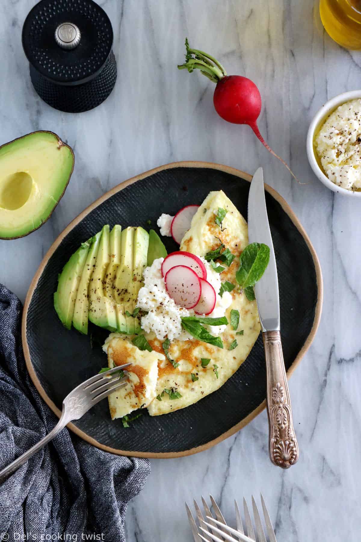 This simple mint ricotta omelet is light, fluffy, and subtly flavored with fresh mint leaves. It doesn't get any more complicated than that.