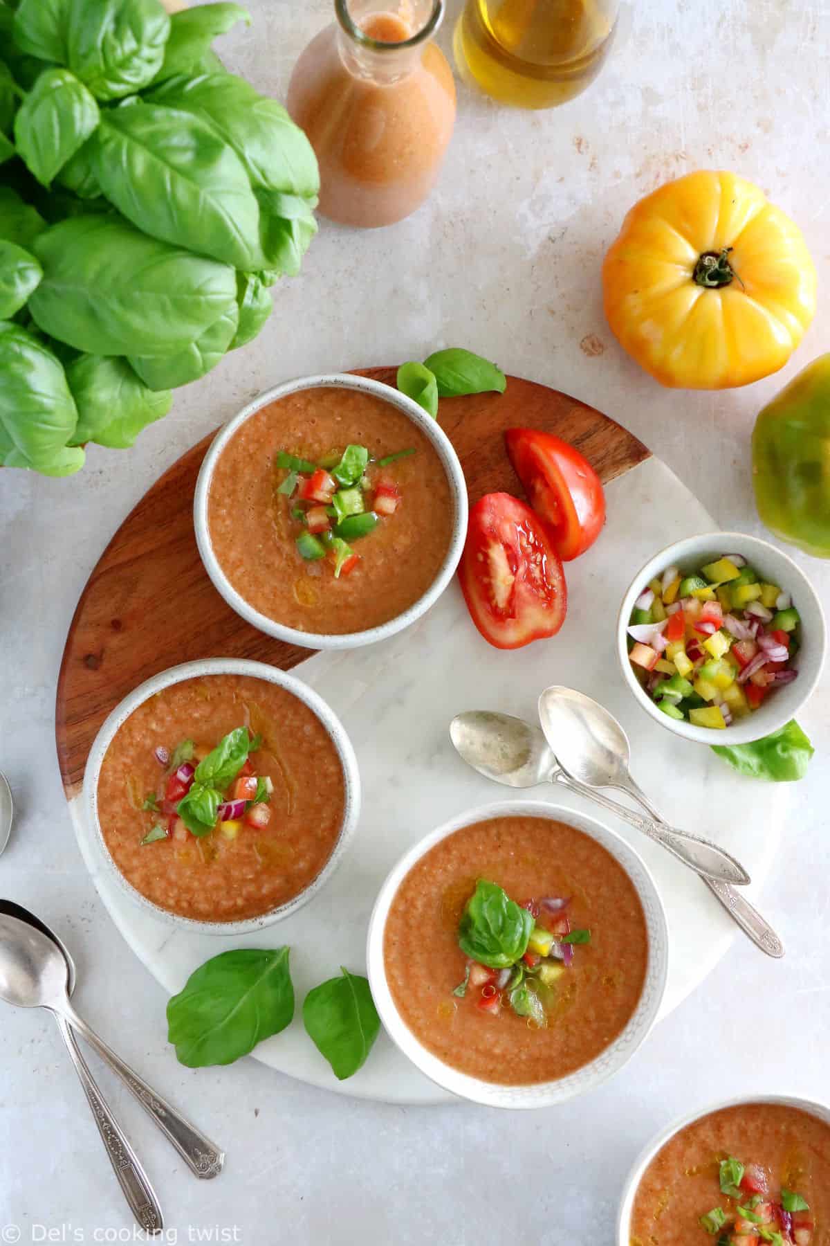 Cool off with this easy 10-minute gazpacho recipe. Prepared with sun-ripe tomatoes and other summer vegetables mixed in a blender with other seasoning, this chilled soup is super refreshing and bursting with fresh-from-the-garden flavors.