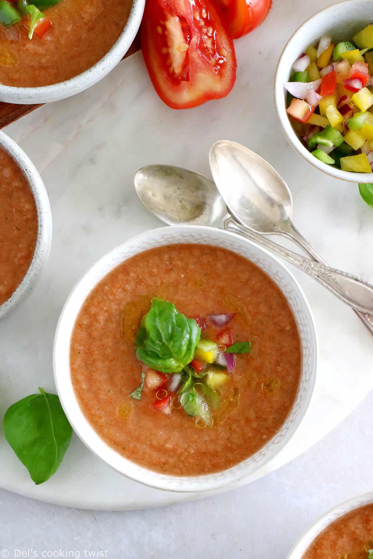 Cool off with this easy 10-minute gazpacho recipe. Prepared with sun-ripe tomatoes and other summer vegetables mixed in a blender with other seasoning, this chilled soup is super refreshing and bursting with fresh-from-the-garden flavors.