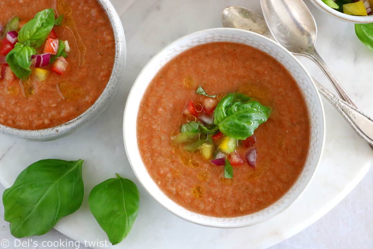 Cool off with this easy 10-minute gazpacho recipe. Prepared with sun-ripe tomatoes and other summer vegetables mixed in a blender with other seasoning, this chilled soup is super refreshing and bursting with fresh-from-the-garden flavors.